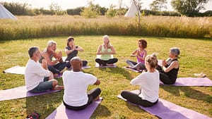 Yoga class with participants enjoying a technology-free environment