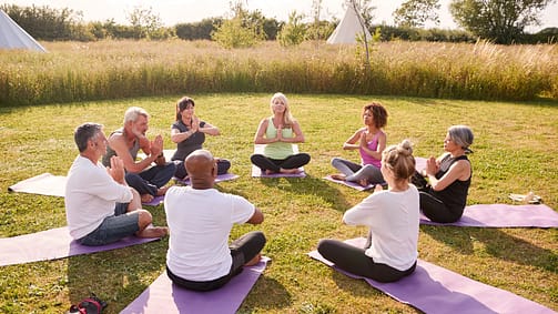 Yoga class with participants enjoying a technology-free environment